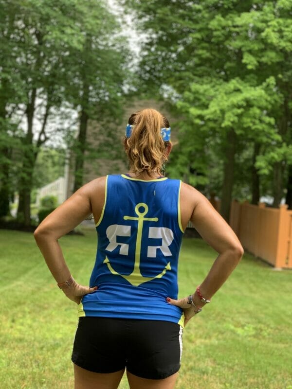 Rhode Races Running Singlets worn by a female runner showing the back print
